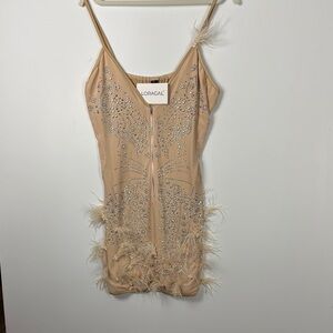 LORAGAL SZ XL NWT mini dress It has silver studs pearls and feathers on the hem